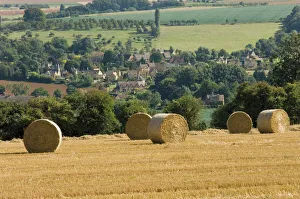 Bales of hay with Chipping Campden beyond, from the Cotswolds Way footpath Bales of hay with Chipping Campden beyond, from the Cotswolds Way footpath