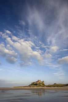 Bamburgh Castle bathed in evening light, viewed from Bamburgh Beach, Bamburgh Bamburgh Castle bathed in evening light, viewed from Bamburgh Beach, Bamburgh