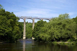 Barge and pedestrians on the Pontcysyllte Aqueduct, UNESCO World Heritage Site Barge and pedestrians on the Pontcysyllte Aqueduct, UNESCO World Heritage Site