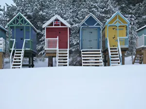 Beach huts in the snow at Wells next the Sea, Norfolk, England Beach huts in the snow at Wells next the Sea, Norfolk, England