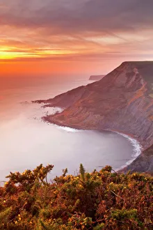 A beautiful sunset over Chapmans Pool on Dorsets Jurassic Coast, UNESCO World Heritage Site, Dorset, England A beautiful sunset over Chapmans Pool on Dorsets Jurassic Coast, UNESCO World Heritage Site, Dorset, England