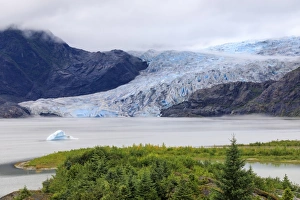 Blue iceberg, blue ice face of Mendenhall Glacier, elevated view, Visitor Centre Blue iceberg, blue ice face of Mendenhall Glacier, elevated view, Visitor Centre