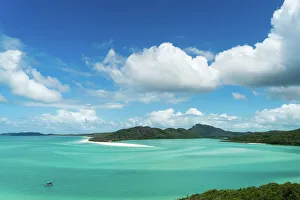 A boat in the shallow water of Whitsunday Island in tropical Queensland, Australia A boat in the shallow water of Whitsunday Island in tropical Queensland, Australia
