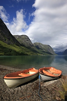 Boats pulled up on the shore of a fjord in the Fjordland region, western Norway, Scandinavia Boats pulled up on the shore of a fjord in the Fjordland region, western Norway, Scandinavia