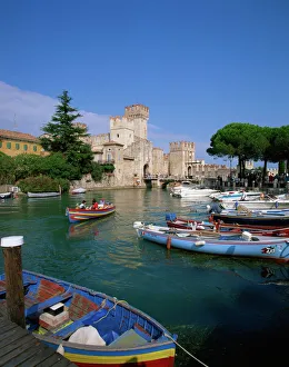 Boats at Sirmione on Lake Garda, Lombardy, Italy, Europe Boats at Sirmione on Lake Garda, Lombardy, Italy, Europe