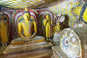 Dambulla Cave Temple Prints: Buddha figures inside Dambulla cave Buddhist temple complex