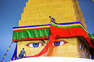 Adorning Collection: Buddhist Monks decorating the temple at Bouddha (Boudhanath), UNESCO World Heritage Site