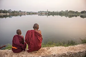 Buddhist Monks at Kandawgyi Lake at sunset, Pyin Oo Lwin (Pyin U Lwin), Mandalay Region Buddhist Monks at Kandawgyi Lake at sunset, Pyin Oo Lwin (Pyin U Lwin), Mandalay Region