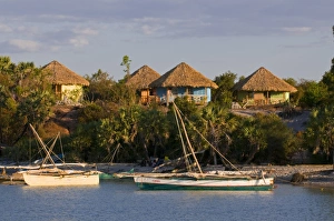 Bungalows and fishing boats at the Antsanitian Beach Resort, Mahajanga Bungalows and fishing boats at the Antsanitian Beach Resort, Mahajanga