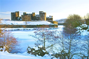 Wales Travel Destinations Prints: Caerphilly Castle in snow, Caerphilly, near Cardiff, Gwent, Wales, United Kingdom, Europe