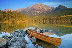 Canoe at Pyramid Lake with Pyramid Mountain in the background, Jasper National Park Canoe at Pyramid Lake with Pyramid Mountain in the background, Jasper National Park
