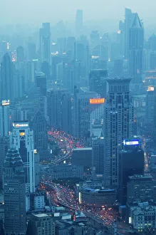 Car light trails and illuminated buildings leading from the Bund, Shanghai, China, Asia Car light trails and illuminated buildings leading from the Bund, Shanghai, China, Asia