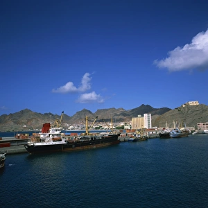 Cargo ships in port, with the town and mountains in the background, Mindelo Cargo ships in port, with the town and mountains in the background, Mindelo