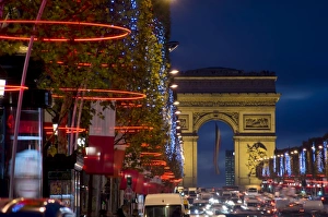 Paris Cityscape At Dusk Prints: Champs Elysees and Arc de Triomphe at dusk, Paris, France, Europe
