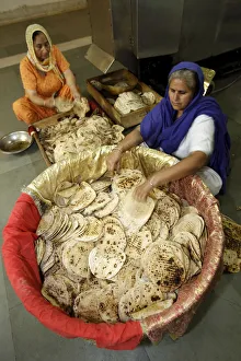 Chapatti making in the communal kitchen of Bangla Sahib Gurdwara, New Delhi, India, Asia Chapatti making in the communal kitchen of Bangla Sahib Gurdwara, New Delhi, India, Asia