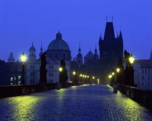 The Charles Bridge at night and city skyline with spires, UNESCO World Heritage Site The Charles Bridge at night and city skyline with spires, UNESCO World Heritage Site