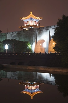 City wall and watch tower reflected in water, built during the first reign of Hongwu the City wall and watch tower reflected in water, built during the first reign of Hongwu the