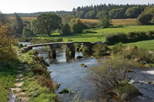 The Clapper Bridge at Postbridge, Dartmoor National Park, Devon, England The Clapper Bridge at Postbridge, Dartmoor National Park, Devon, England