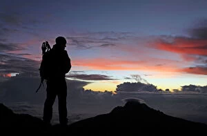 Images Dated 6th February 2010: A climber looks towards Mawenzi from near the summit of Mount Kilimanjaro at dawn