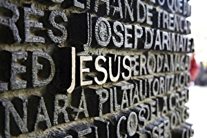 Close up of writing which fills the bronze doors of the Sagrada Familia Close up of writing which fills the bronze doors of the Sagrada Familia