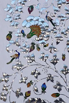 Detail of the coloured glass and mirror inlay work Detail of the coloured glass and mirror inlay work