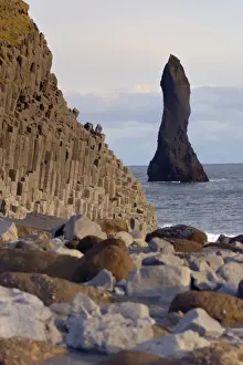 Tranquil Coastal Scenery Prints: Columnar basalt cliffs and Reynisdrangar sea stack standing in the sea