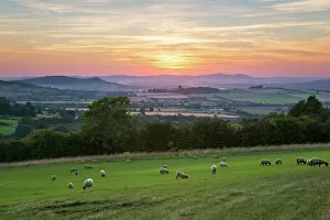 Images Dated 15th August 2016: Cotswold landscape and distant Malvern Hills at sunset, Farmcote, Cotswolds, Gloucestershire