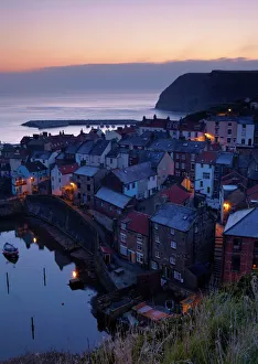Dawn from Cowbar overlooking the beautiful village of Staithes, North Yorkshire Dawn from Cowbar overlooking the beautiful village of Staithes, North Yorkshire