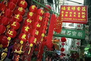 Related Images Collection: Decorations for Chinese New Year for sale in a street in Central, Hong Kong Island