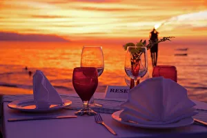 Dinner on the beach in Downtown at sunset, Puerto Vallarta, Jalisco, Mexico, North America Dinner on the beach in Downtown at sunset, Puerto Vallarta, Jalisco, Mexico, North America