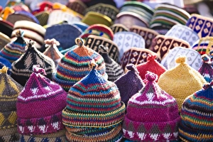 Display of handmade hats for sale in market in Rahba Kedima Square in the souks of Display of handmade hats for sale in market in Rahba Kedima Square in the souks of