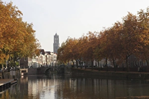 The Dom Tower and canal waterway on a sunny autumn day, Utrecht, Utrecht Province The Dom Tower and canal waterway on a sunny autumn day, Utrecht, Utrecht Province