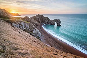 Durdle Door at sunrise, Lulworth Cove, Jurassic Coast, UNESCO World Heritage Site Durdle Door at sunrise, Lulworth Cove, Jurassic Coast, UNESCO World Heritage Site