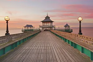 A dusk view of Clevedon Pier, in Clevedon, on the Bristol Channel coast of Somerset A dusk view of Clevedon Pier, in Clevedon, on the Bristol Channel coast of Somerset