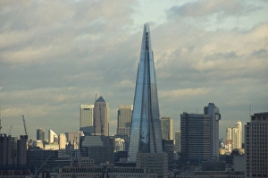 Early morning, Shard Tower, designed by Enzo Piano, Canary Wharf in the background, London, England, United Kingdom Early morning, Shard Tower, designed by Enzo Piano, Canary Wharf in the background, London, England, United Kingdom