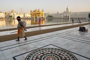 Golden Temple Prints: Print of Elderly Sikh Pilgrim Walking Around Holy Pool