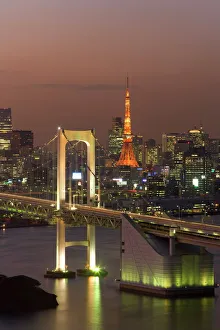 Elevated view of Rainbow Bridge and Tokyo Tower illuminated at dusk Elevated view of Rainbow Bridge and Tokyo Tower illuminated at dusk