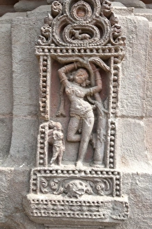 Erotic carving of woman on the 11th century Rajarani temple, known as the love temple, dedicated to Lord Shiva Erotic carving of woman on the 11th century Rajarani temple, known as the love temple, dedicated to Lord Shiva