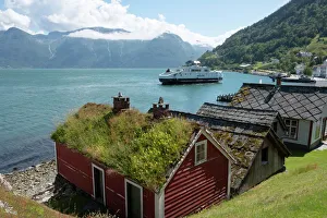 A ferry leaving the village of Utne on Hardanger Fjord, Vestlandet, Norway, Scandinavia A ferry leaving the village of Utne on Hardanger Fjord, Vestlandet, Norway, Scandinavia