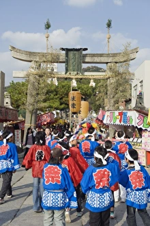 Festival goers at a torii gate at Hadaka matsuri (Naked Festival), Hofu city Festival goers at a torii gate at Hadaka matsuri (Naked Festival), Hofu city
