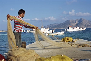 Greek Island Life Style Prints: Fisherman sorting his nets