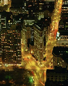 The Flat Iron Building and Broadway illuminated at night The Flat Iron Building and Broadway illuminated at night