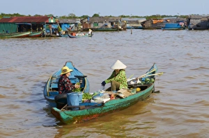 Floating Vietnamese village, Lake Tonle Sap, UNESCO Biosphere Reserve, Cambodia Floating Vietnamese village, Lake Tonle Sap, UNESCO Biosphere Reserve, Cambodia