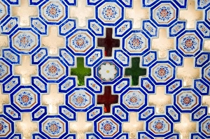 Glass and tile work embedded in walls of the Juna Mahal Fort Glass and tile work embedded in walls of the Juna Mahal Fort
