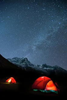 Glowing tents at Samogaon on the Manaslu circuit trek, Himalayas, Nepal, Asia Glowing tents at Samogaon on the Manaslu circuit trek, Himalayas, Nepal, Asia