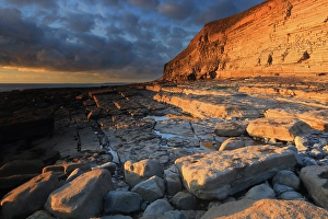 UK Coastal Photography Prints: Golden evening light on limestone cliffs