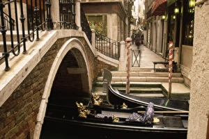 Gondola Ride Venice Prints: Gondolas beside a bridge