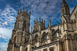 Gothic Cathedral Architecture Prints: Gothic cathedral tower against a dramatic cloudy sky