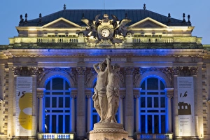 The Three Graces fountain and the Opera in Place de la Comedie in the city of Montpellier The Three Graces fountain and the Opera in Place de la Comedie in the city of Montpellier