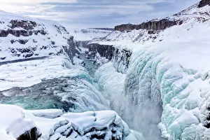 Gullfoss Waterfall, partly frozen in winter, Gullfoss, Iceland, Polar Regions Gullfoss Waterfall, partly frozen in winter, Gullfoss, Iceland, Polar Regions